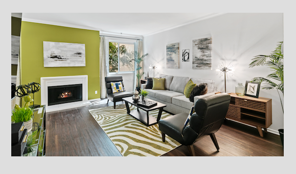 Living room with lime green accent wall and contemporary furnishings
